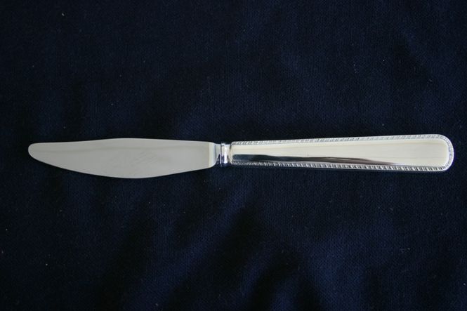 Hovedbilde Rådhus med bord liten spisekniv med langt skaft